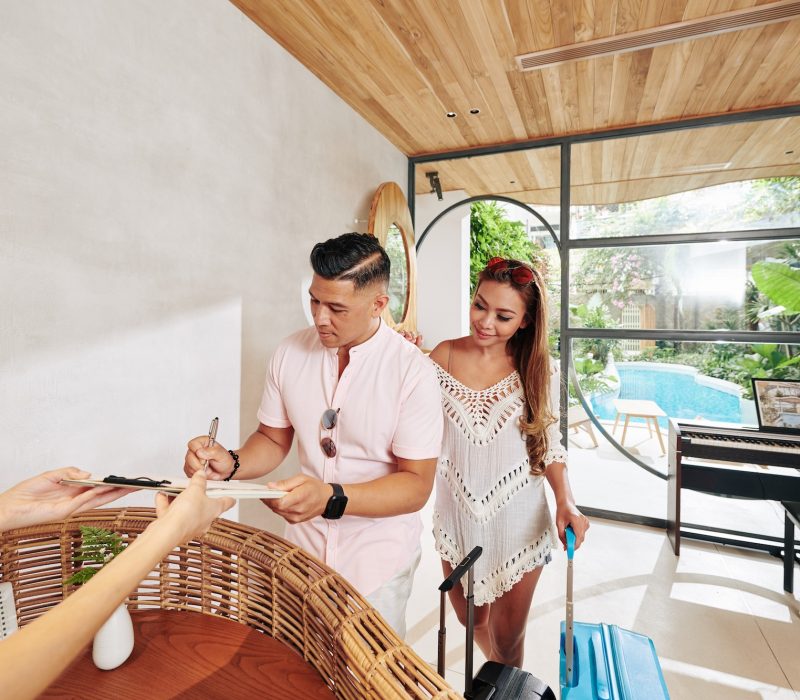 Couple at Hotel Reception